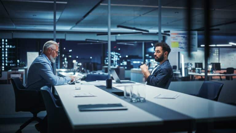 Businesspeople in modern office business meeting of two managers