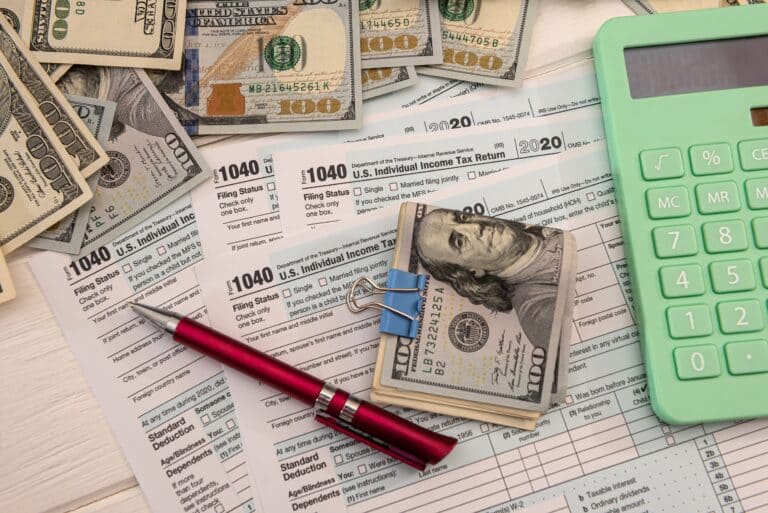 Income taxes calculation, deductions, and understanding gross vs. net income in a comprehensive guide.